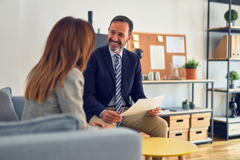 Two,Middle,Age,Business,Workers,Smiling,Happy,And,Confident.,Working Two middle age business workers smiling happy and confident. Working together with smile on face holding documents at the office